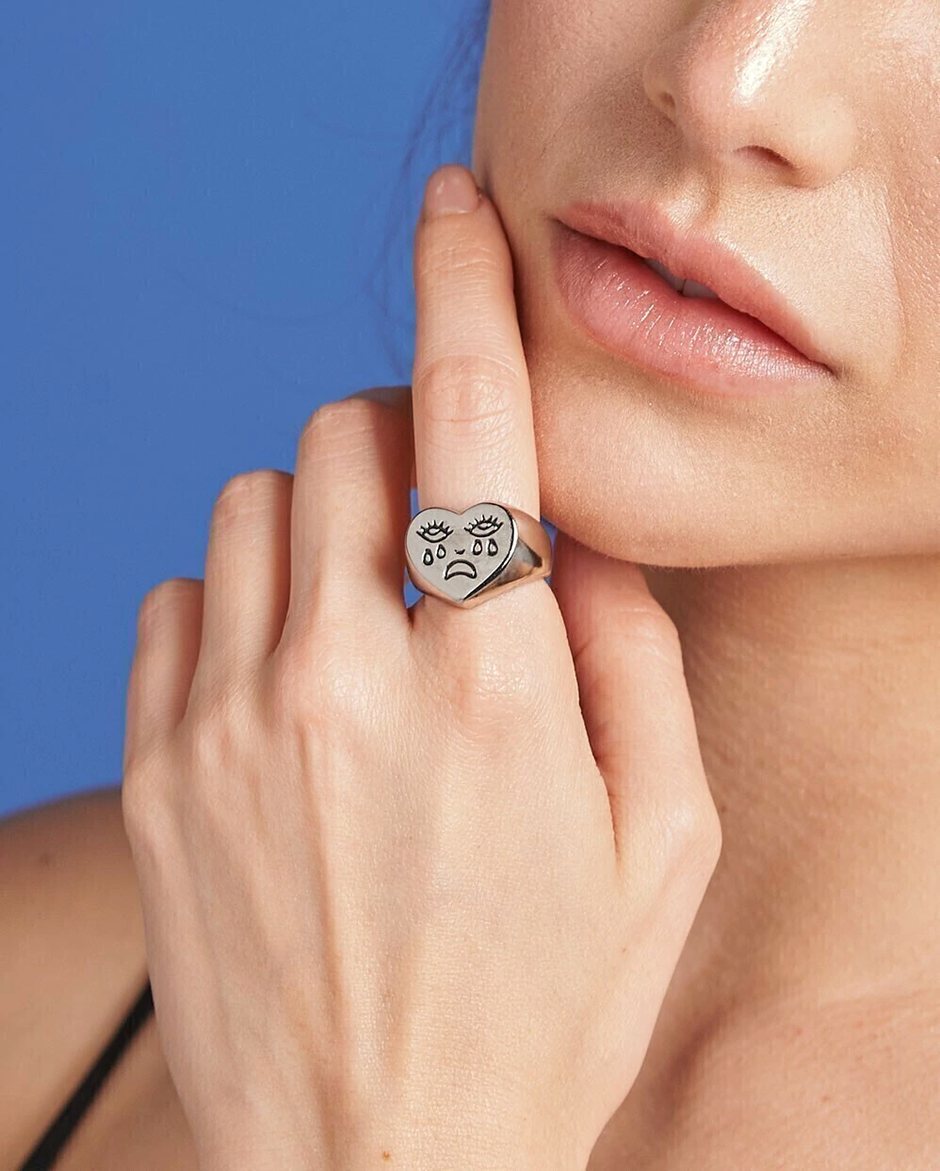 Velmont Heart Signet Ring with Crying Face, lifestyle photo on hand